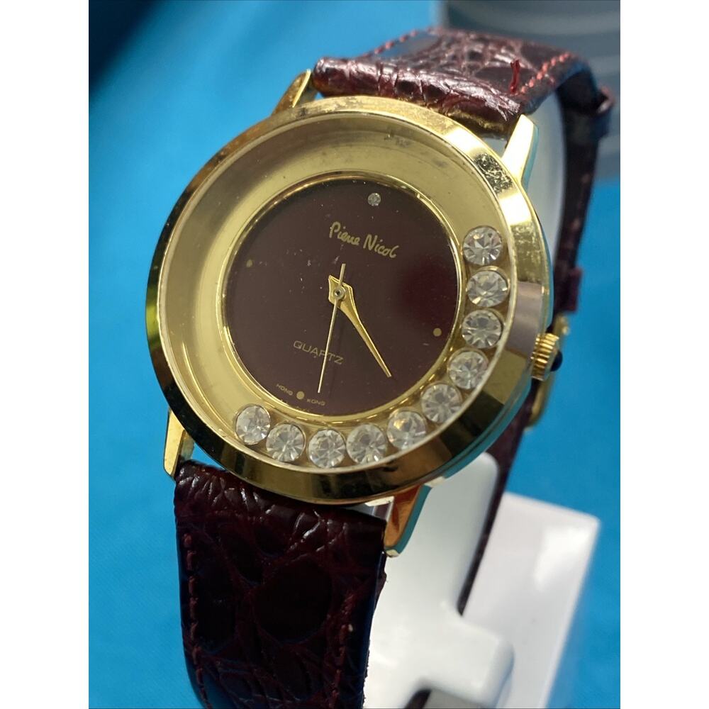 Pierre Nicol Womens Gold Red Flosting Gem Quartz Watch New Battery